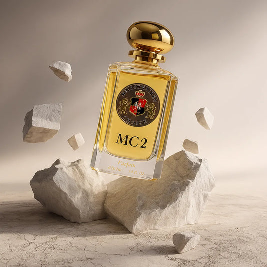 Gold perfume bottle with 'MC2' branding on a textured surface
